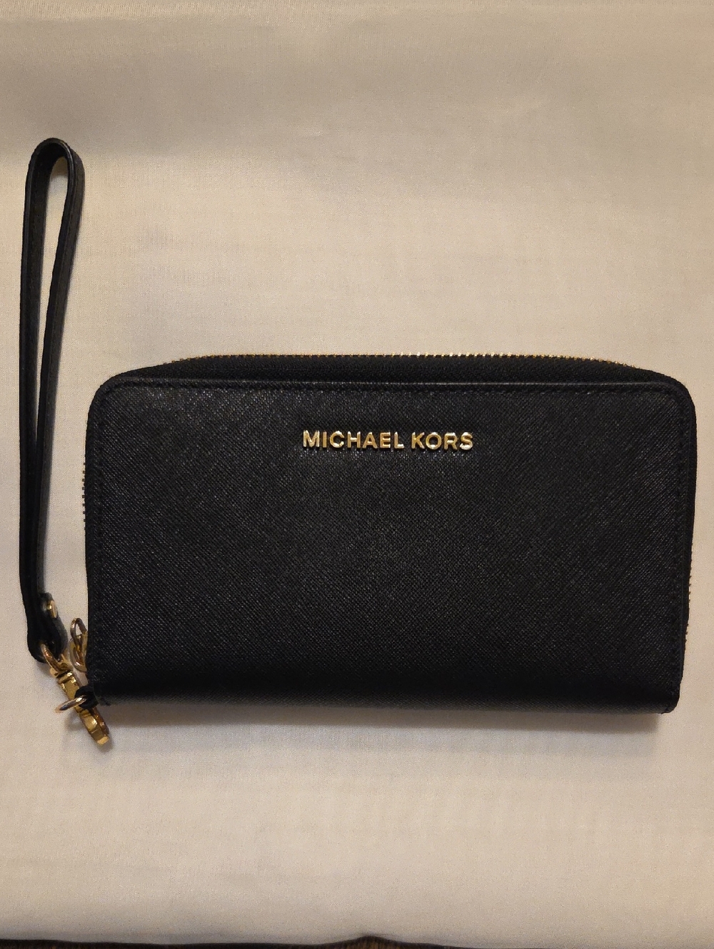 Michael Kors Black Zip-Around Wristlet with Gold Hardware